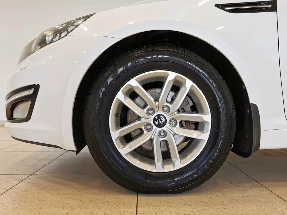 Kia Optima 2.0 AT (150 л.с.) Comfort Белый в АВИЛОН. Слайд №9