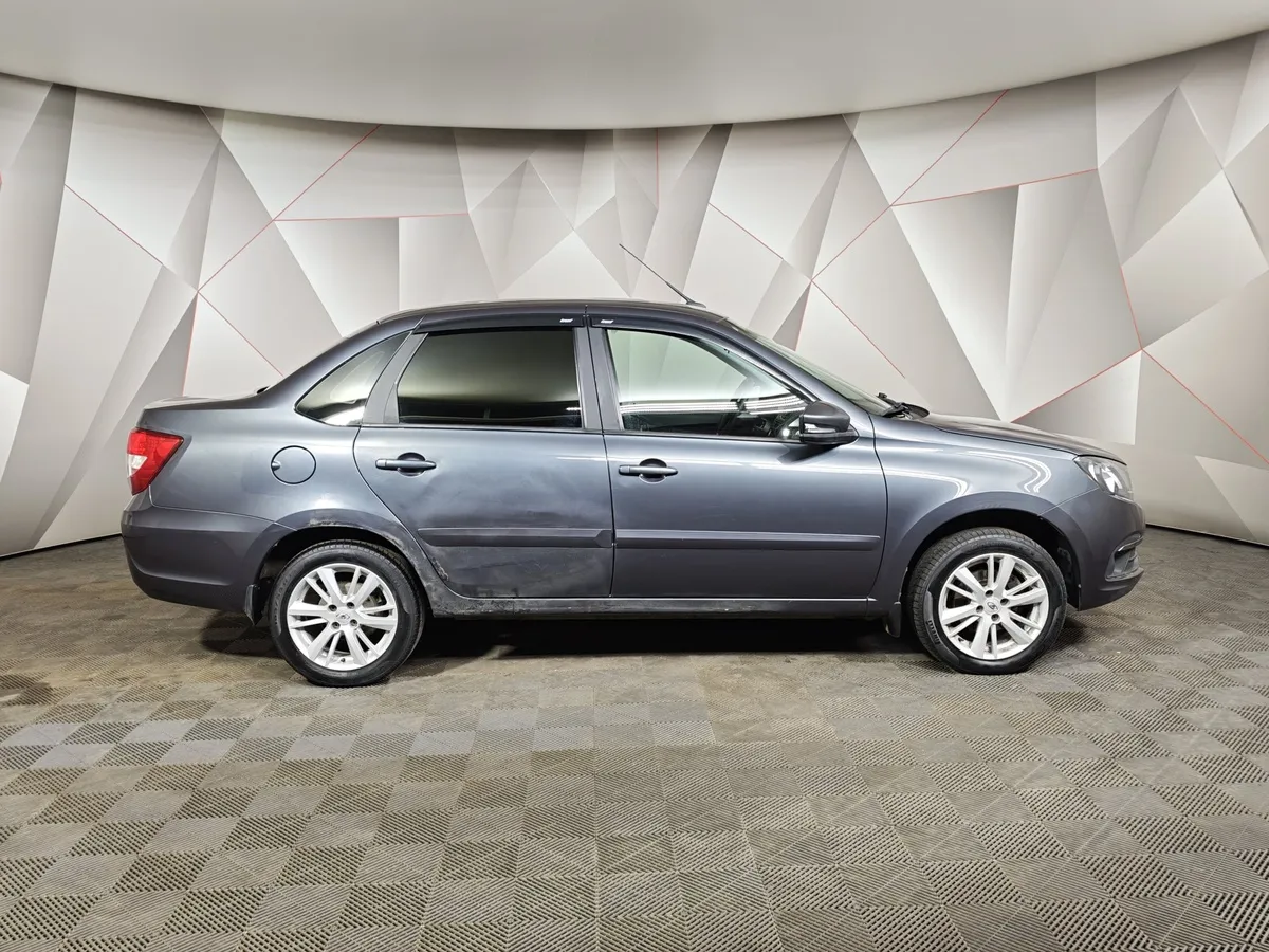 ВАЗ (Lada) Granta 1.6 MT 16 кл (106 л.с.) Серый в АВИЛОН. Слайд №6