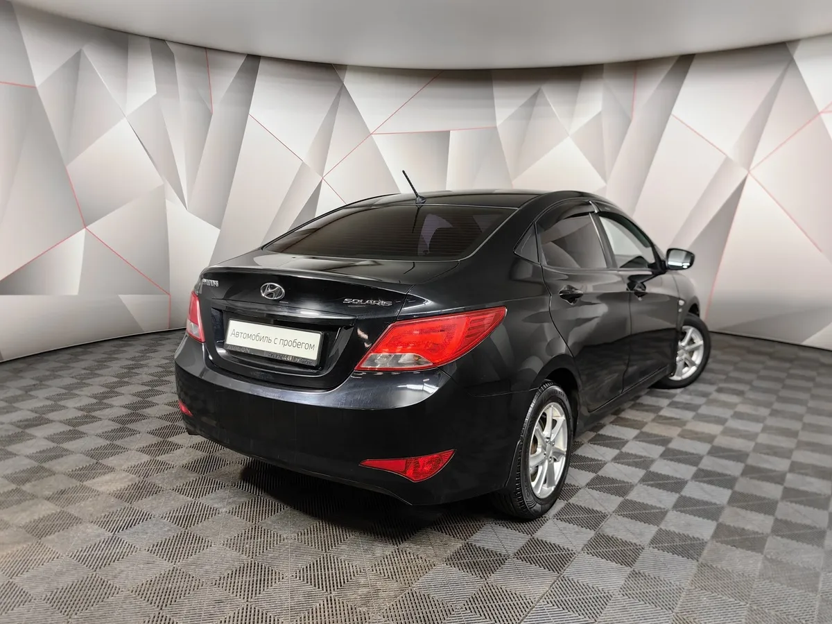 Hyundai Solaris 1.6 AT (123 л.с.) Comfort Черный в АВИЛОН. Слайд №2