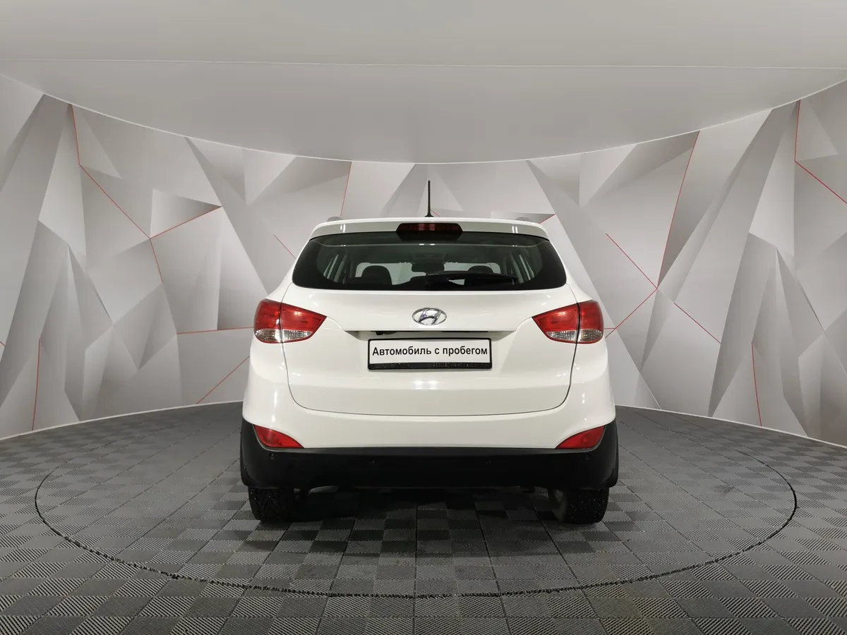 Hyundai ix35 2.0 AT 4WD (150 л.с.) Comfort + Navi Белый в АВИЛОН. Слайд №8