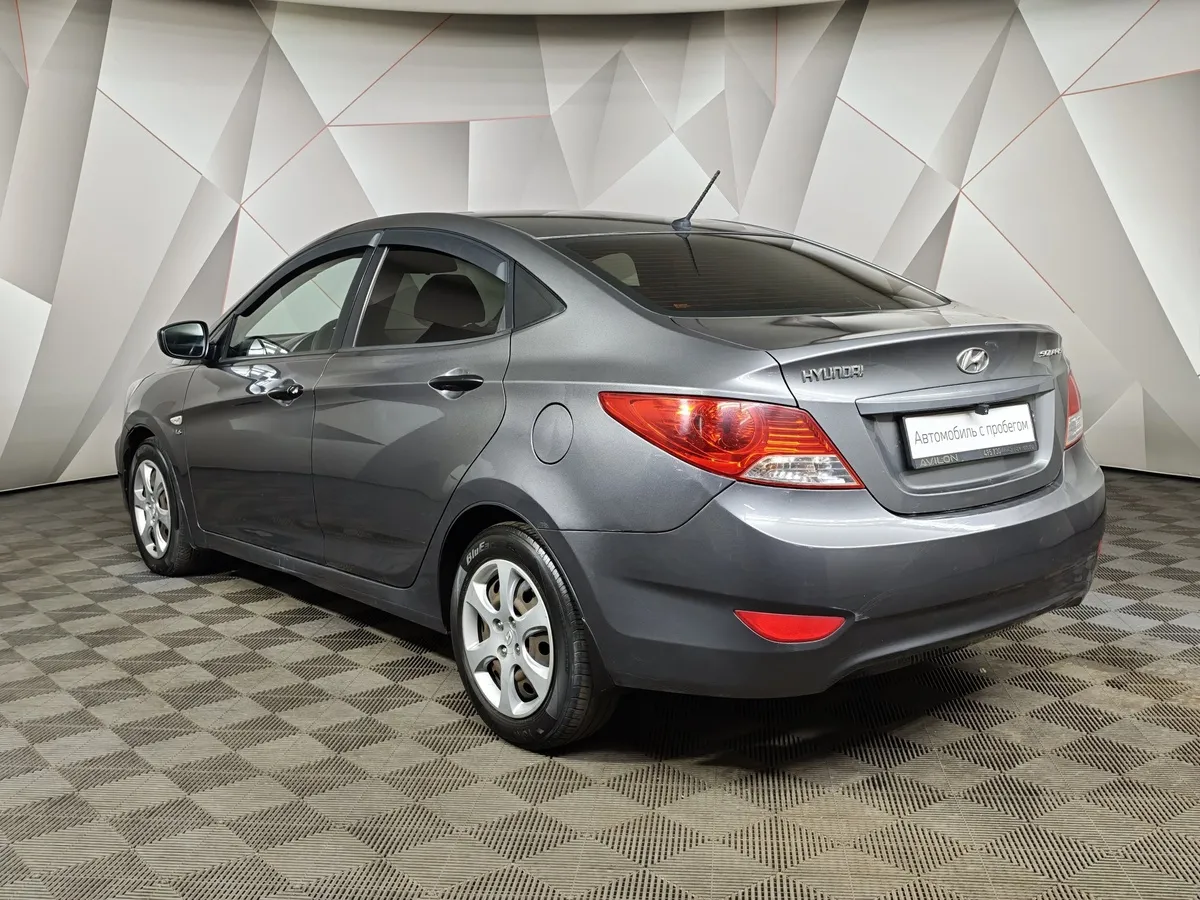 Hyundai Solaris 1.4 MT (100 л.с.) Active Plus Серый в АВИЛОН. Слайд №4