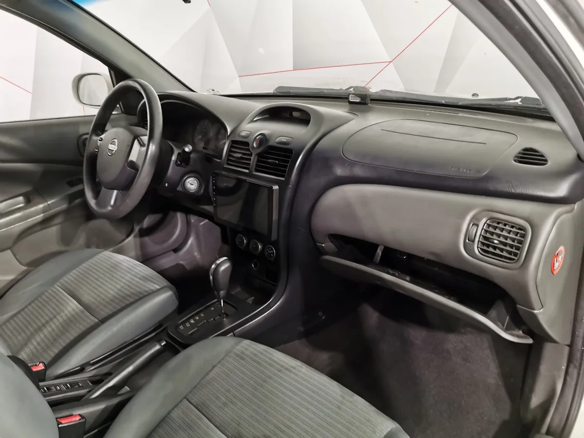 Nissan Almera Classic 1.6 AT (107 л.с.) Белый в АВИЛОН. Слайд №11