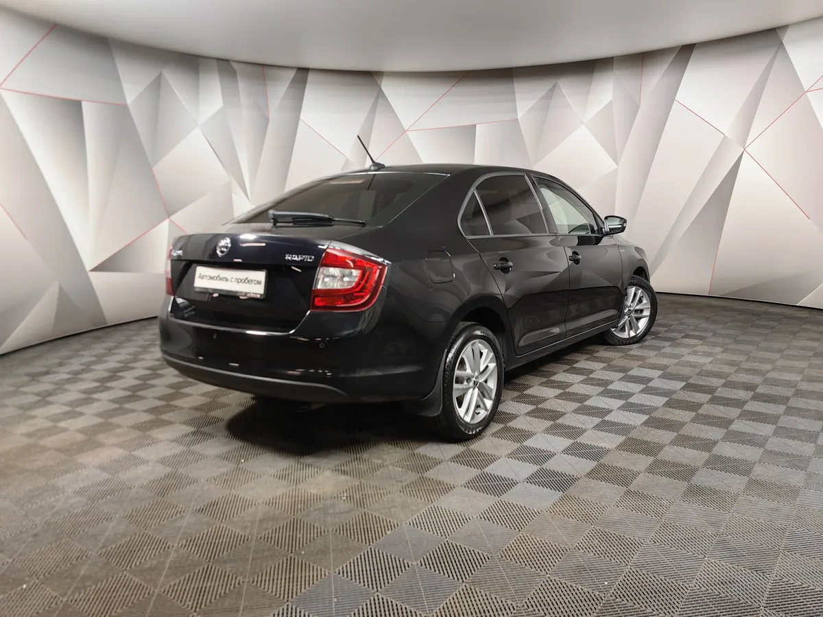 Skoda Rapid 1.6 MT (90 л.с.) Черный в АВИЛОН. Слайд №2