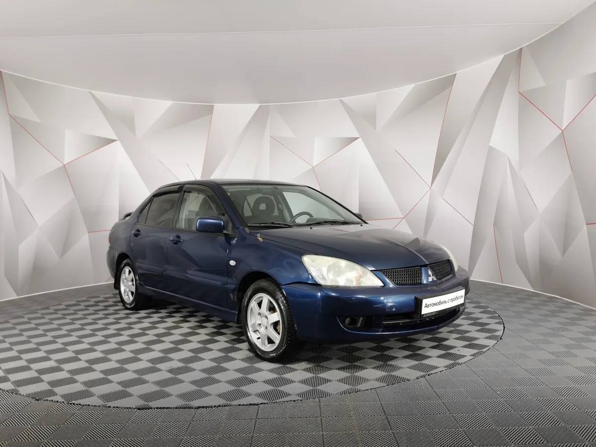 Mitsubishi Lancer 1.6 MT (100 л.с.) Синий в АВИЛОН. Слайд №3