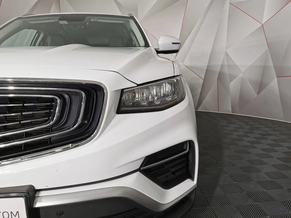 Geely Atlas Pro 1.5T AT FWD (177 л.с.) Luxury Белый в АВИЛОН. Слайд №10