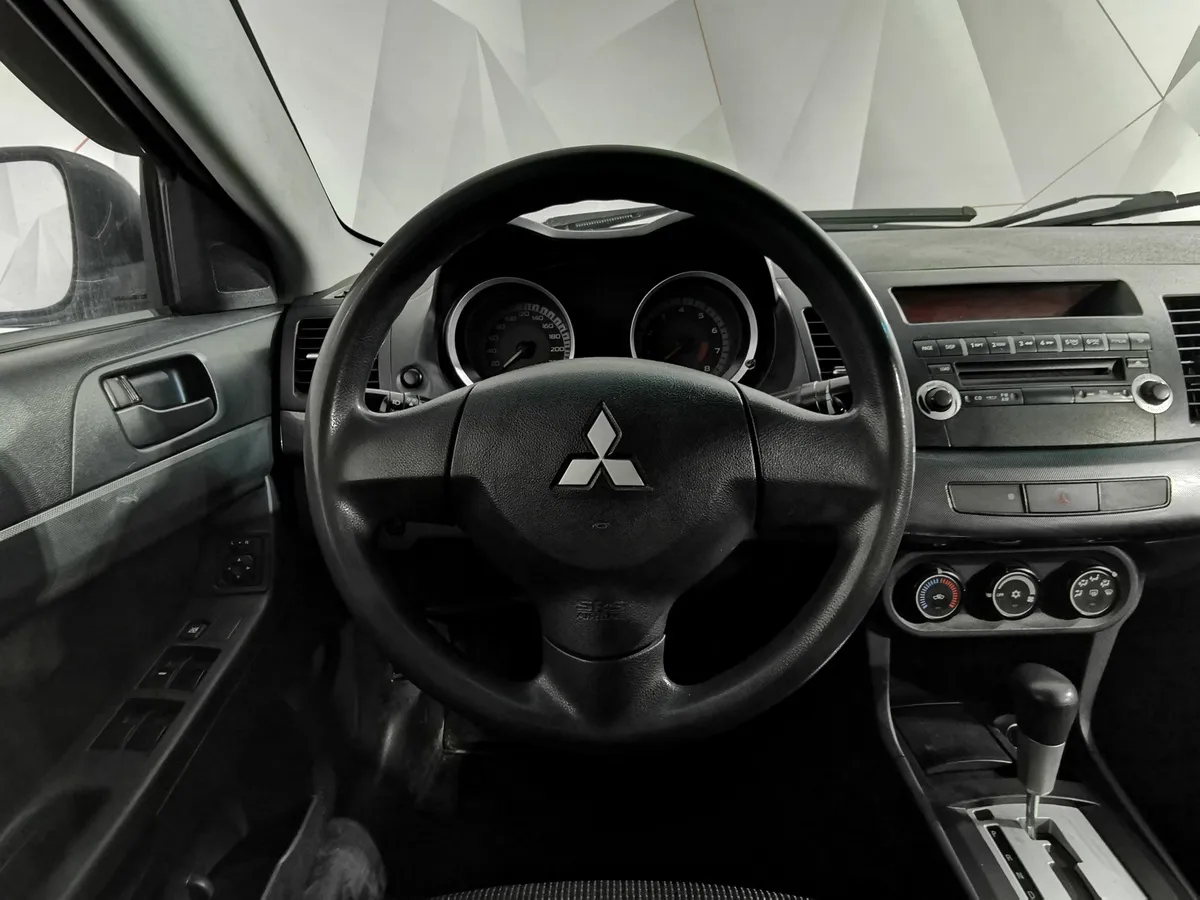 Mitsubishi Lancer 1.6 AT (117 л.с.) Зеленый в АВИЛОН. Слайд №20