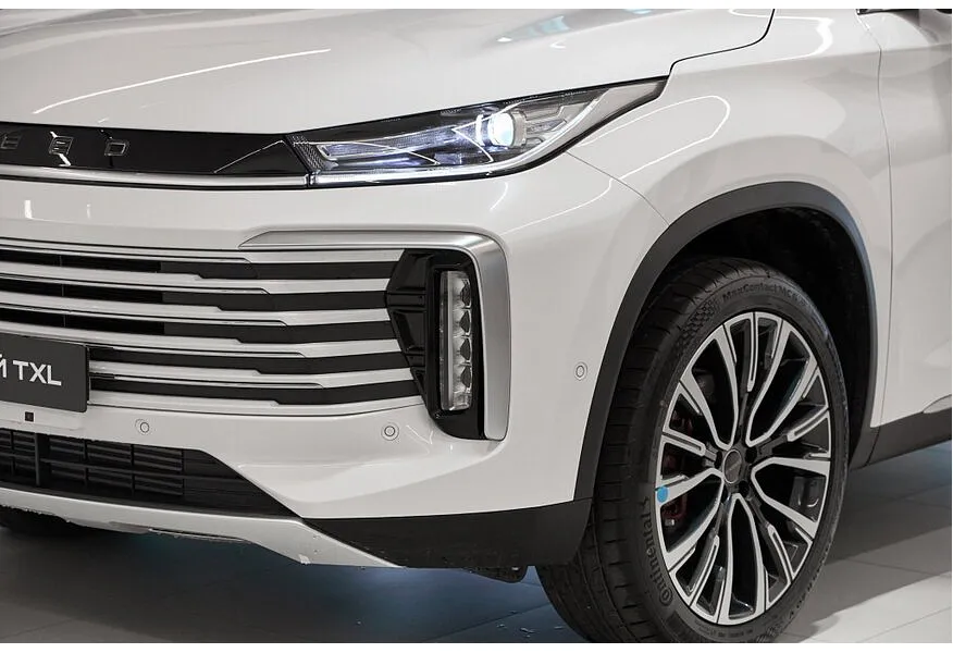 EXEED TXL 2.0 8AT AWD (197 л.с.) Flagship Белый в АВИЛОН. Слайд №9