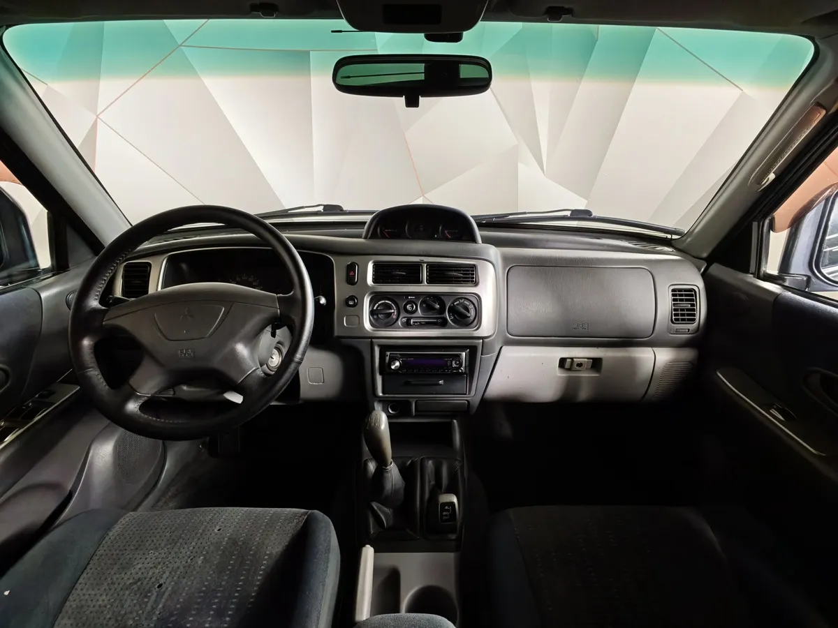 Mitsubishi Pajero Sport 2.5 TD MT 4WD (115 л.с.) Серый в АВИЛОН. Слайд №11