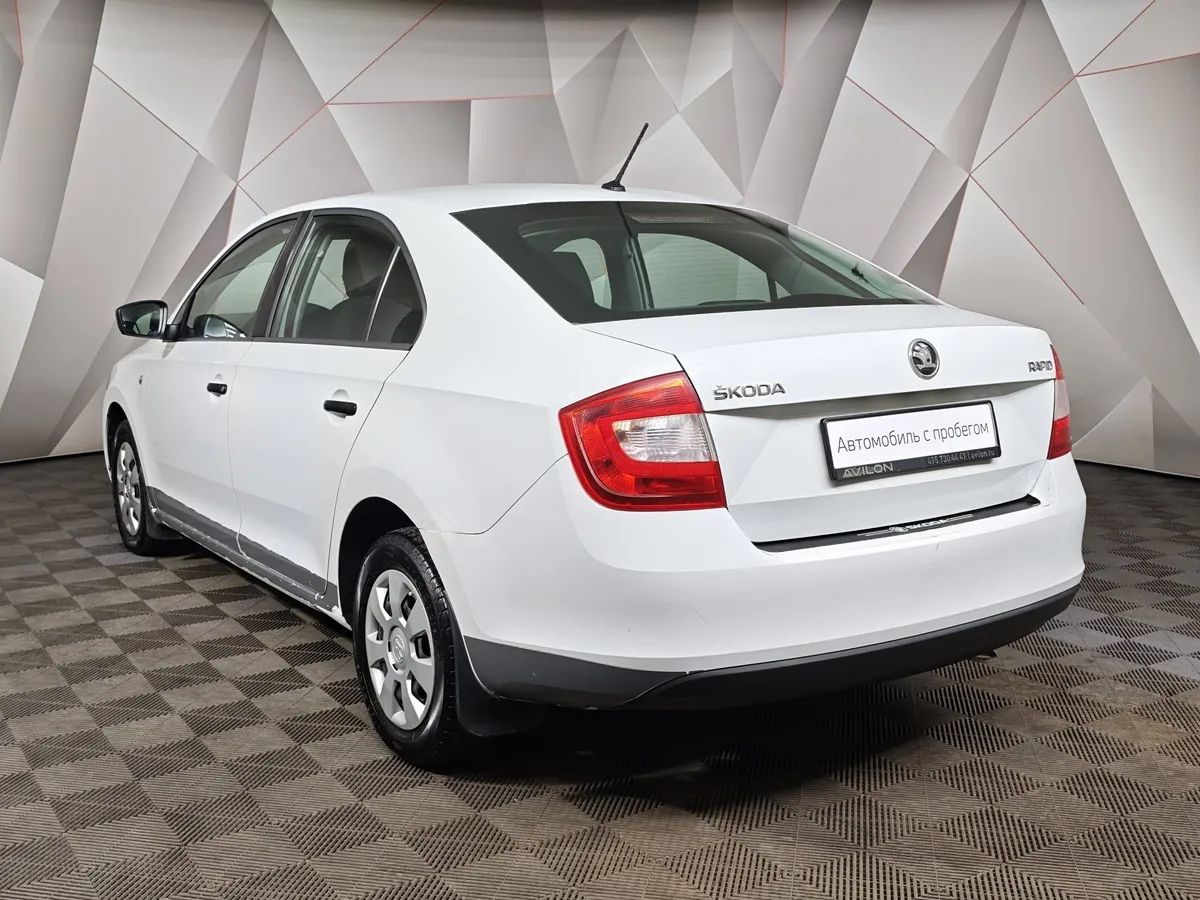 Skoda Rapid 1.6 MT (90 л.с.) Белый в АВИЛОН. Слайд №4