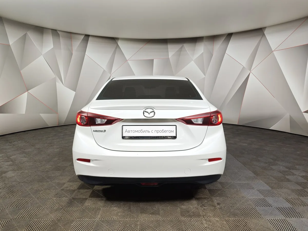 Mazda 3 1.6 MT (104 л.с.) Белый в АВИЛОН. Слайд №8