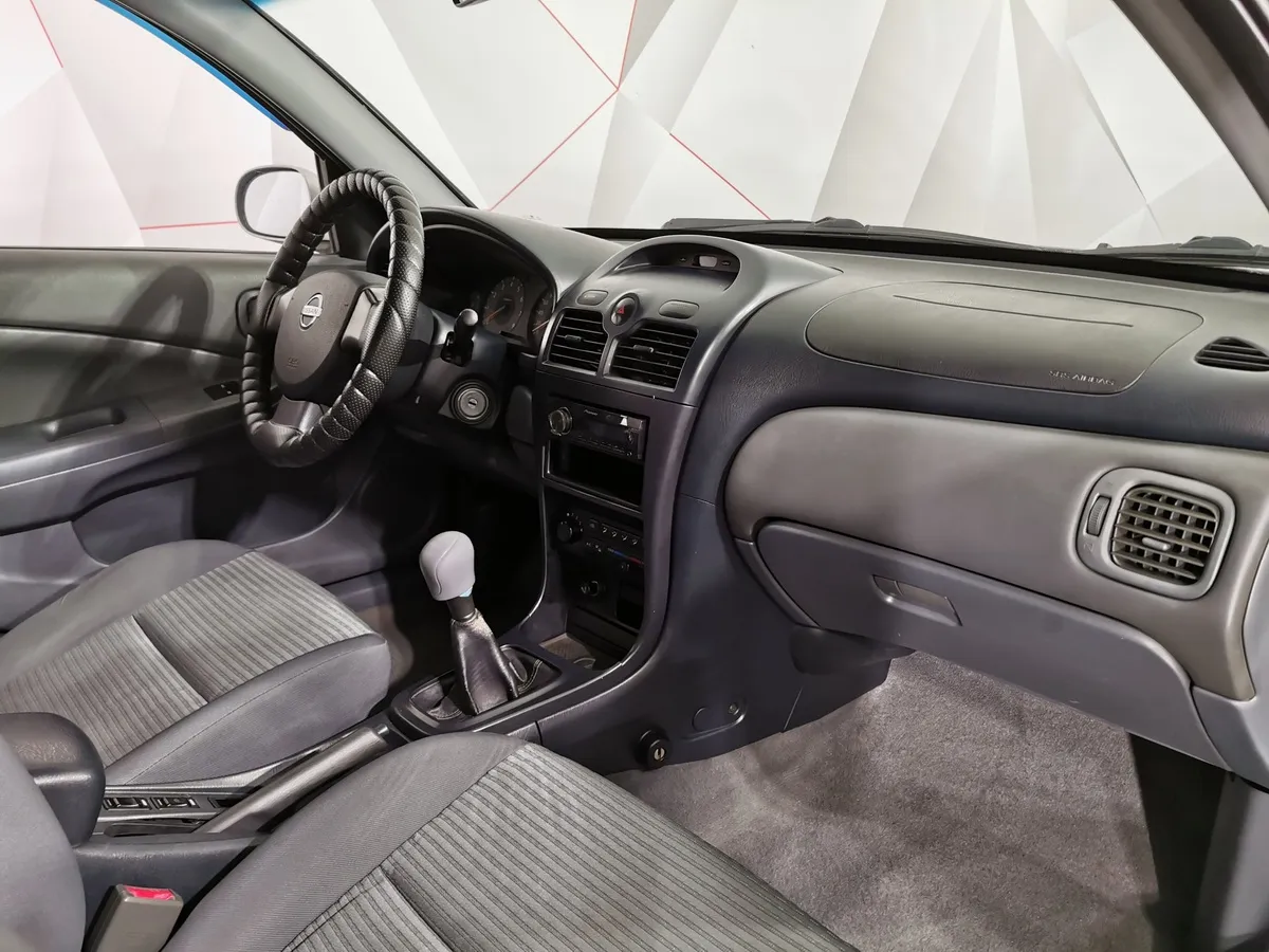 Nissan Almera Classic 1.6 MT (107 л.с.) Серебристый в АВИЛОН. Слайд №12