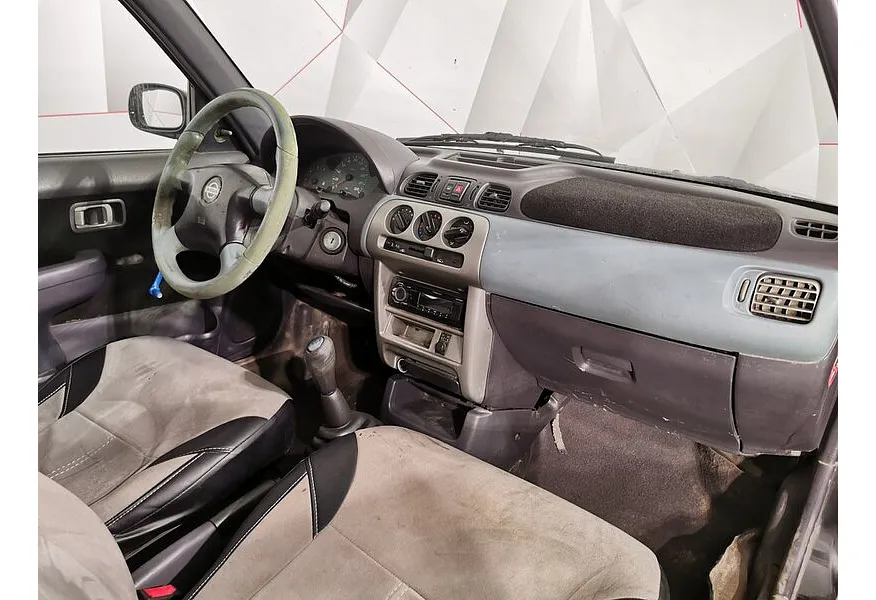 Nissan Micra 1.0 MT (60 л.с.) Черный в АВИЛОН. Слайд №11