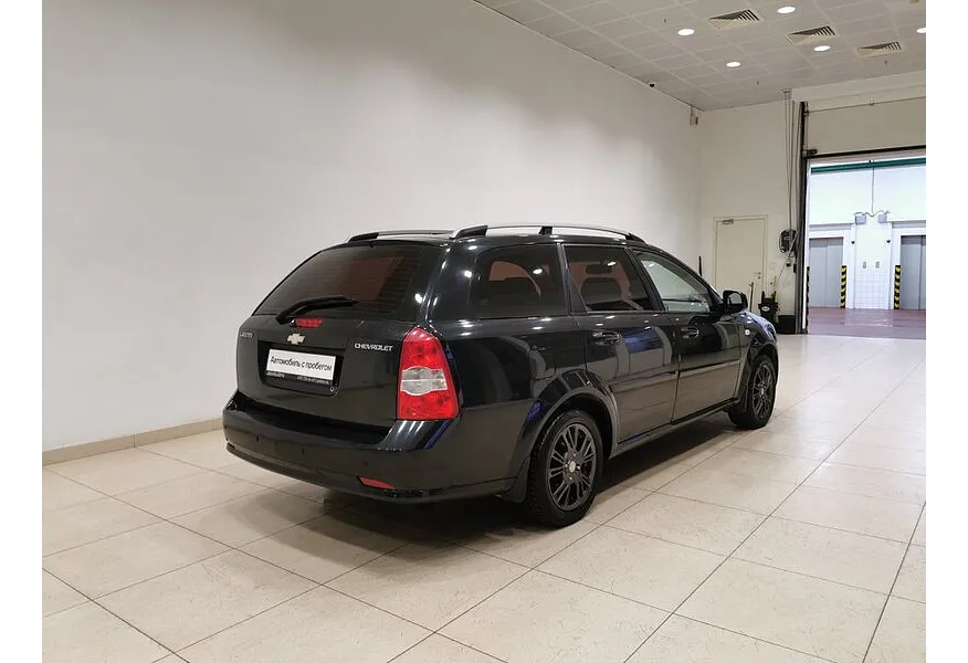 Chevrolet Lacetti 1.6 MT (109 л.с.) Черный в АВИЛОН. Слайд №2
