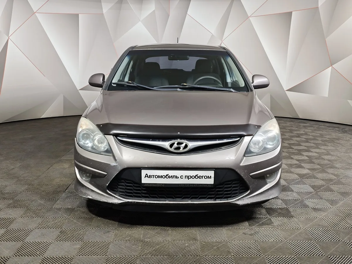 Hyundai i30 1.6 AT (126 л.с.) Коричневый в АВИЛОН. Слайд №7