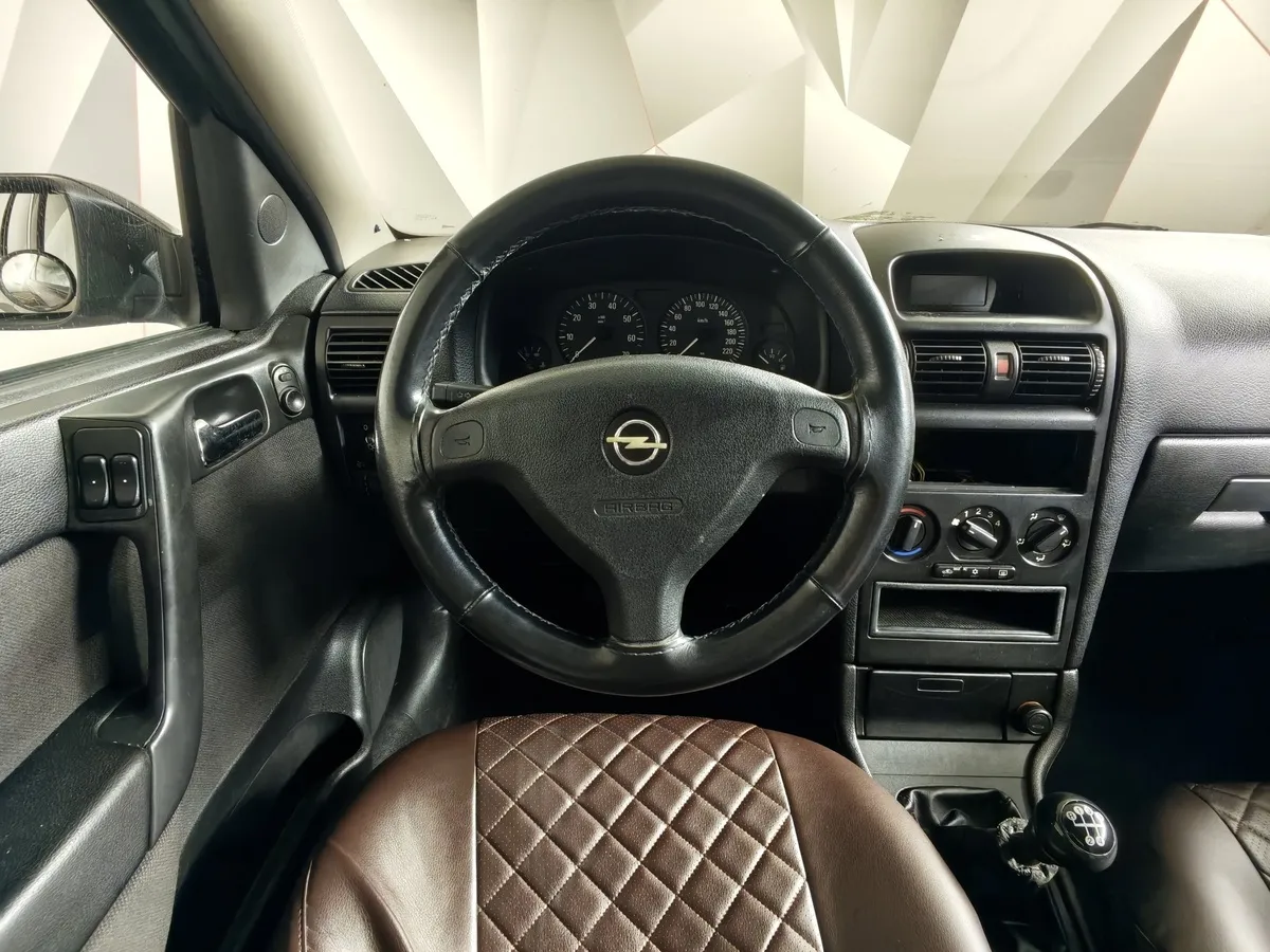 Opel Astra 1.6 Easytronic (115 л.с.) base в АВИЛОН. Слайд №18