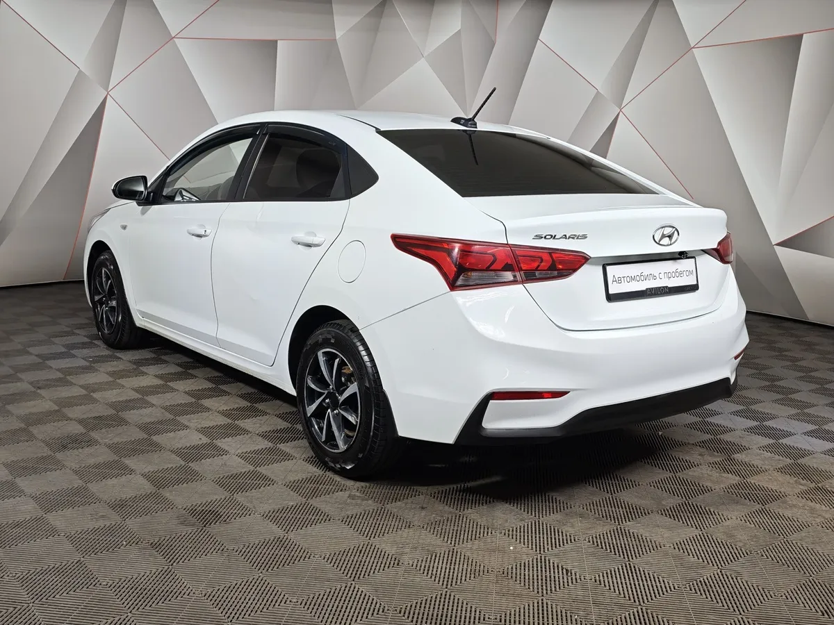 Hyundai Solaris 1.4 AT (107 л.с.) Active Белый в АВИЛОН. Слайд №4