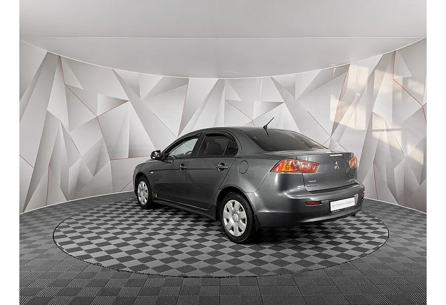 Mitsubishi Lancer 1.8 MT (143 л.с.) Серый в АВИЛОН. Слайд №3