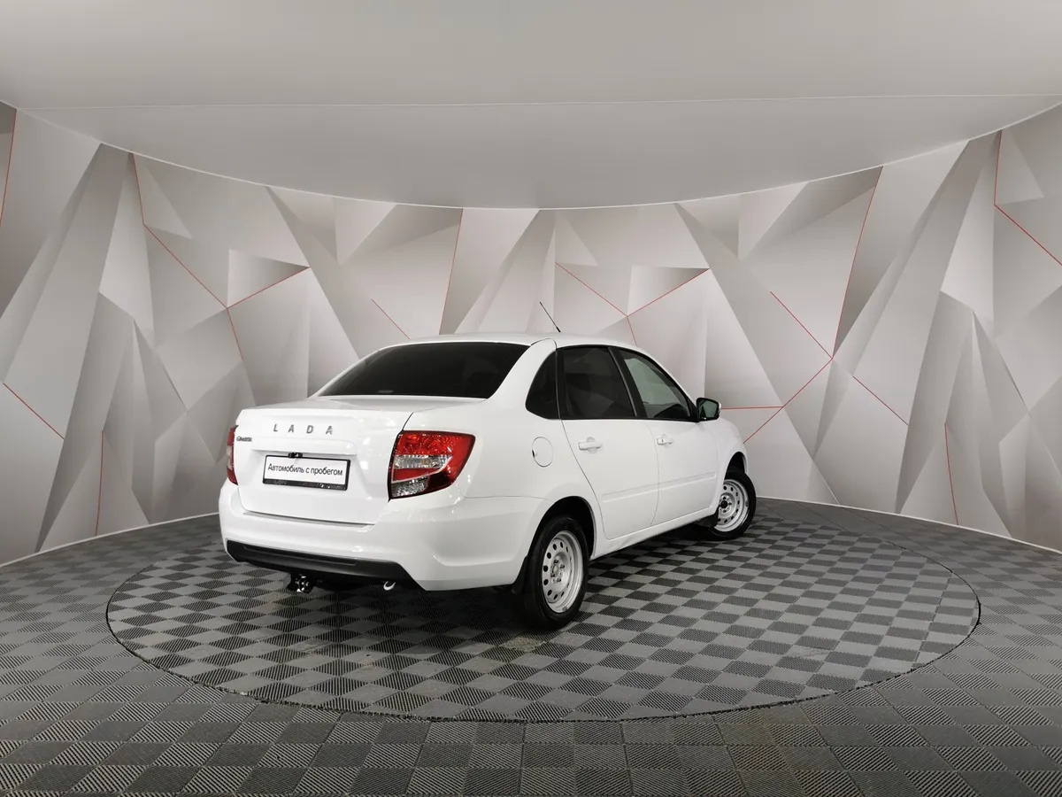 ВАЗ (Lada) Granta 1.6 MT 16кл (98 л.с.) Белый в АВИЛОН. Слайд №2