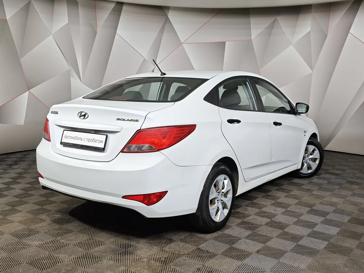 Hyundai Solaris 1.6 MT (123 л.с.) Comfort Белый в АВИЛОН. Слайд №2