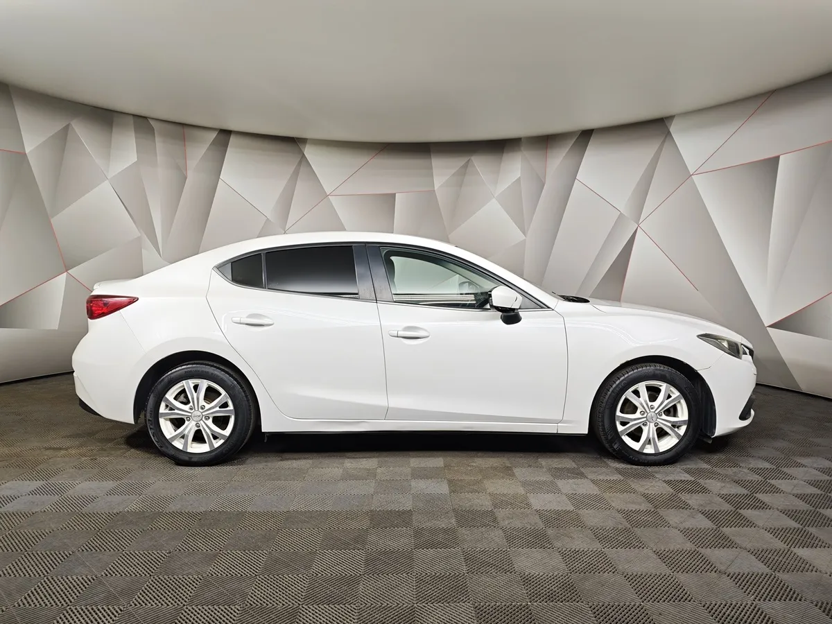 Mazda 3 1.6 MT (104 л.с.) Белый в АВИЛОН. Слайд №6