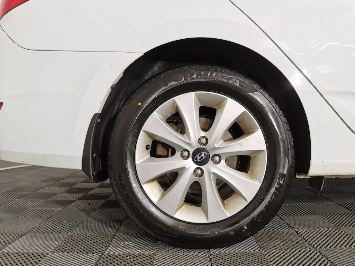 Hyundai Solaris 1.6 AT (123 л.с.) Optima Белый в АВИЛОН. Слайд №9