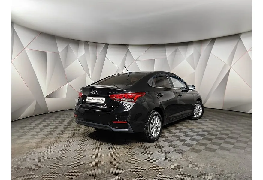 Hyundai Solaris 1.6 AT (123 л.с.) Elegance Черный в АВИЛОН. Слайд №2