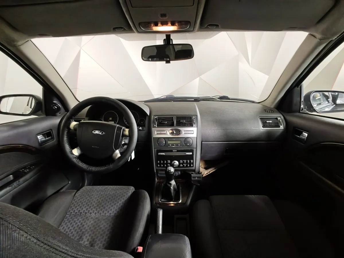 Ford Mondeo 2.0 MT (145 л.с.) Черный в АВИЛОН. Слайд №11