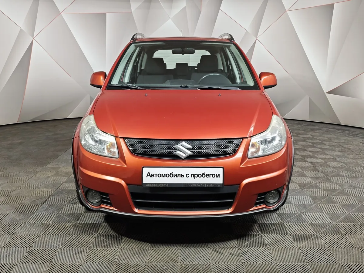 Suzuki SX4 1.6 MT (107 л.с.) Оранжевый в АВИЛОН. Слайд №7