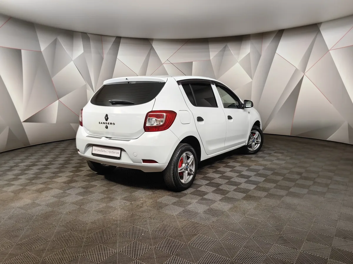 Renault Sandero 1.6 MT (82 л.с.) Confort Белый в АВИЛОН. Слайд №2