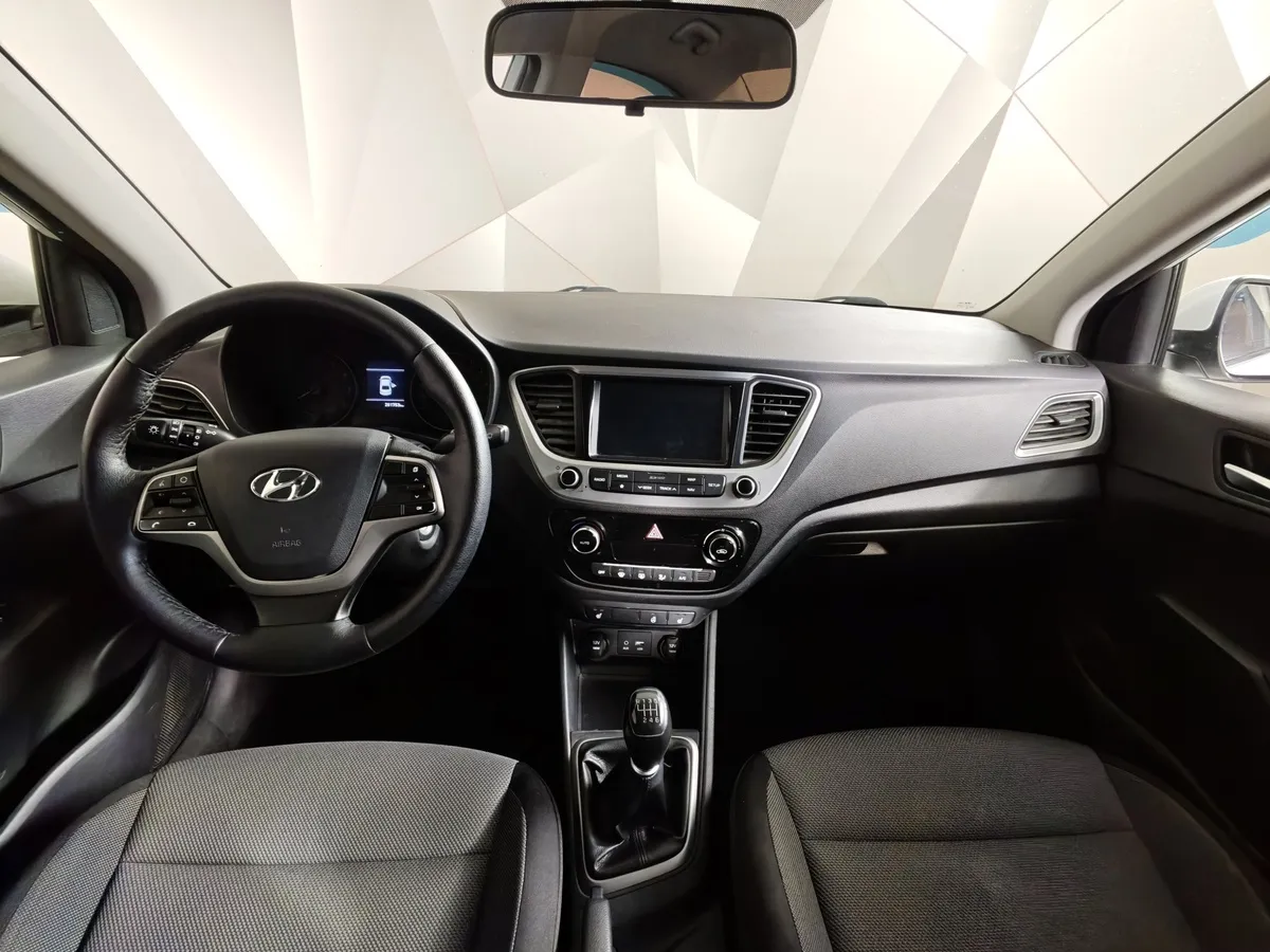 Hyundai Solaris 1.6 MT (123 л.с.) Elegance Белый в АВИЛОН. Слайд №14