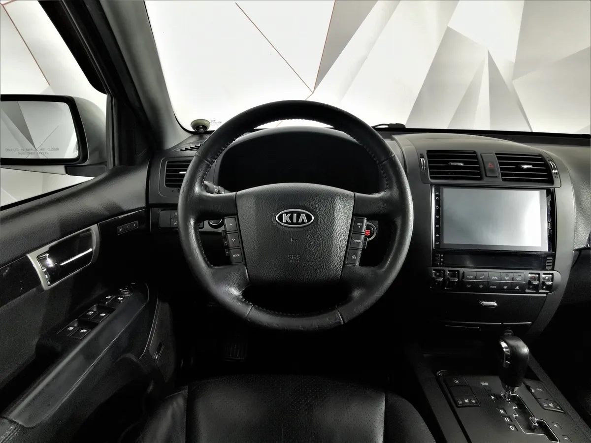 Kia Mohave 3.0 CRDi AT AWD (250 л.с.) Серебристый в АВИЛОН. Слайд №19