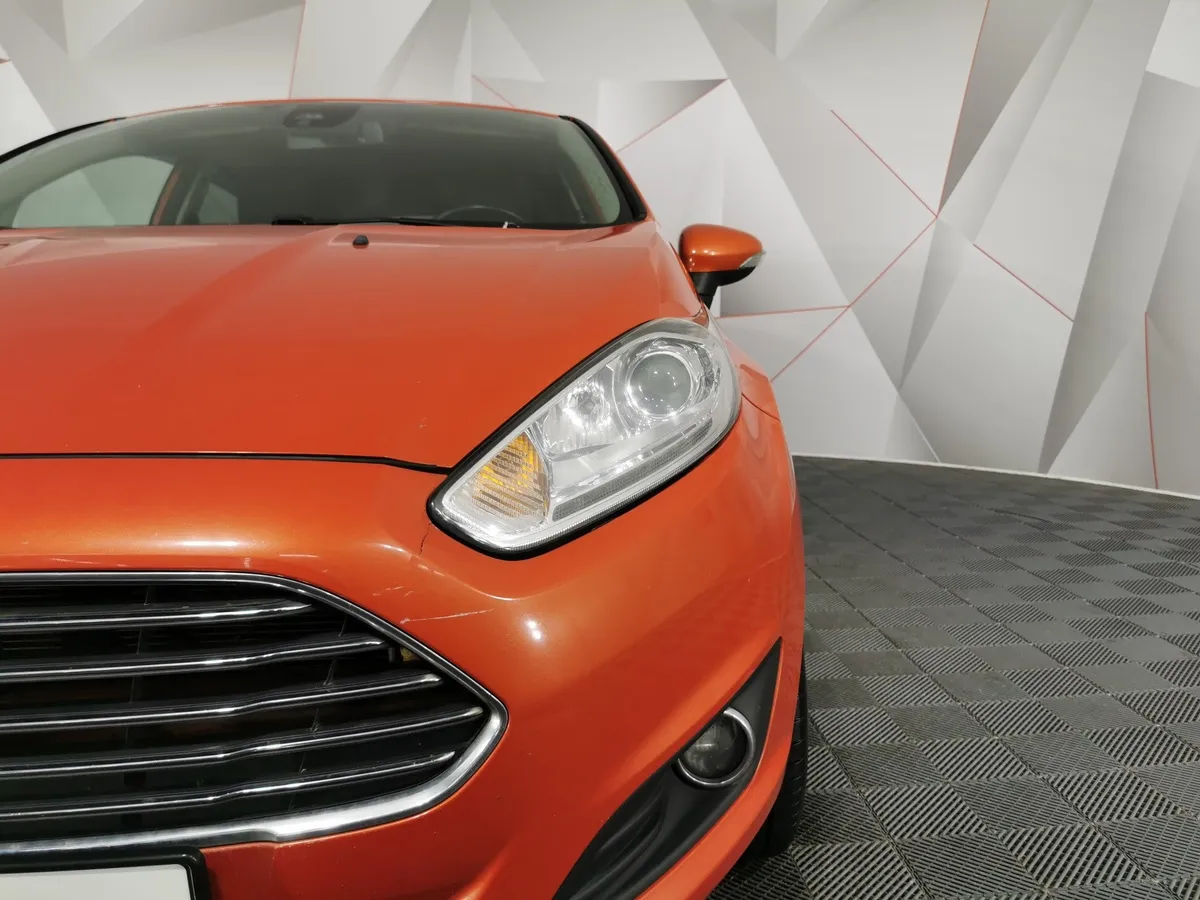 Ford Fiesta 1.4 MT (80 л.с.) Ghia Оранжевый в АВИЛОН. Слайд №10