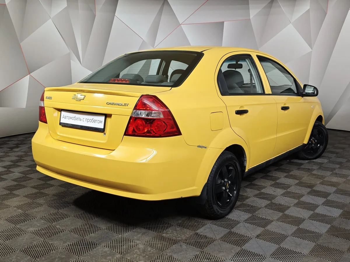 Chevrolet Aveo 1.2 MT (84 л.с.) Желтый в АВИЛОН. Слайд №2