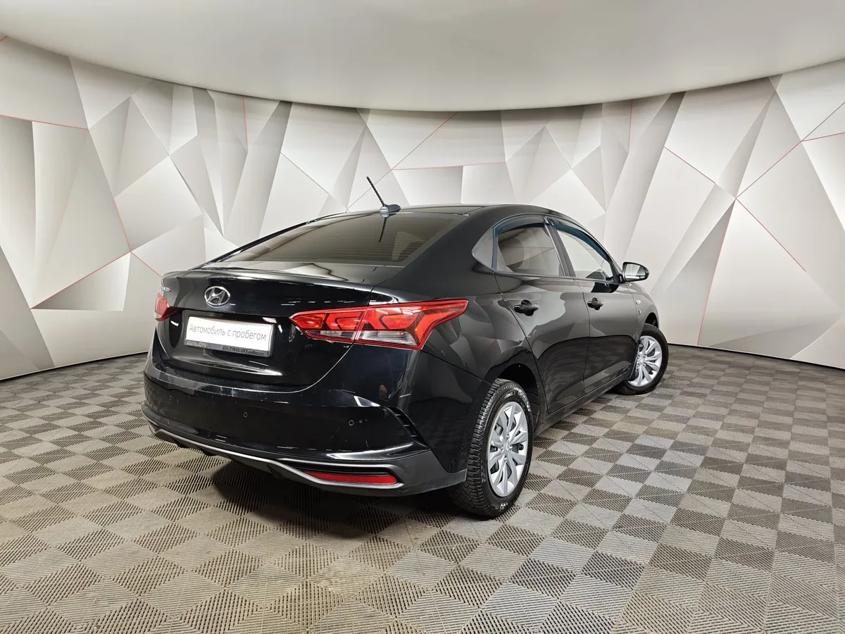 Hyundai Solaris 1.6 AT (123 л.с.) Special Edition Черный в АВИЛОН. Слайд №2