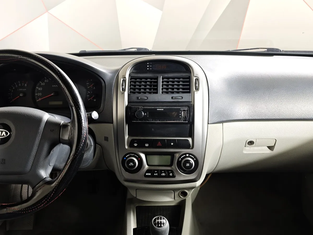 Kia Cerato 1.6 MT (105 л.с.) Черный в АВИЛОН. Слайд №12