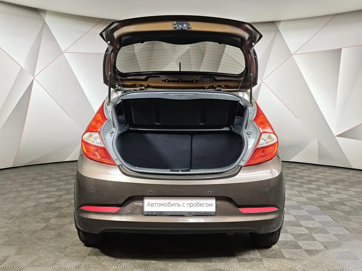 Hyundai Solaris 1.4 AT (107 л.с.) Classic Коричневый в АВИЛОН. Слайд №12