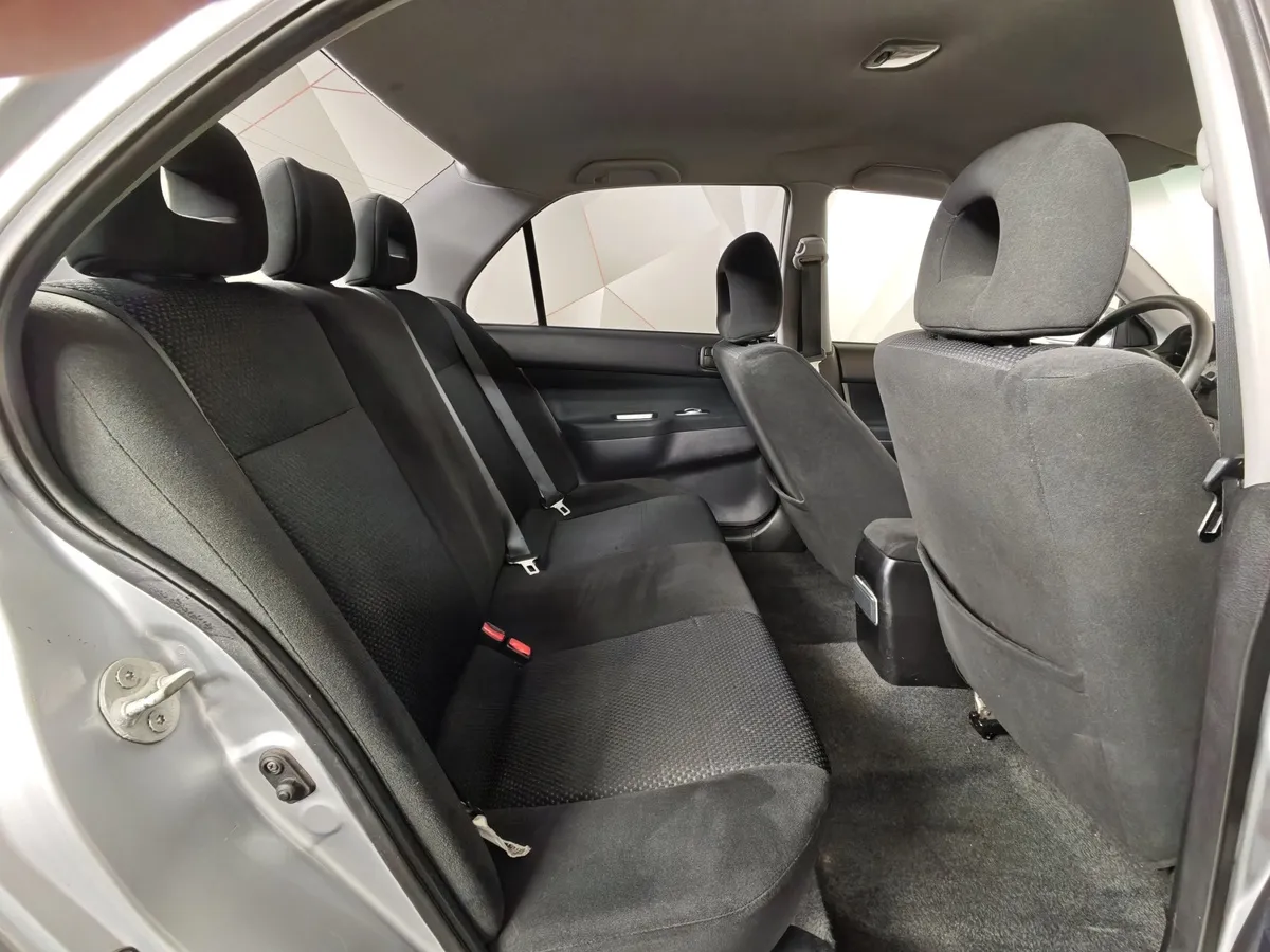 Mitsubishi Lancer 1.6 AT (98 л.с.) Серебристый в АВИЛОН. Слайд №14