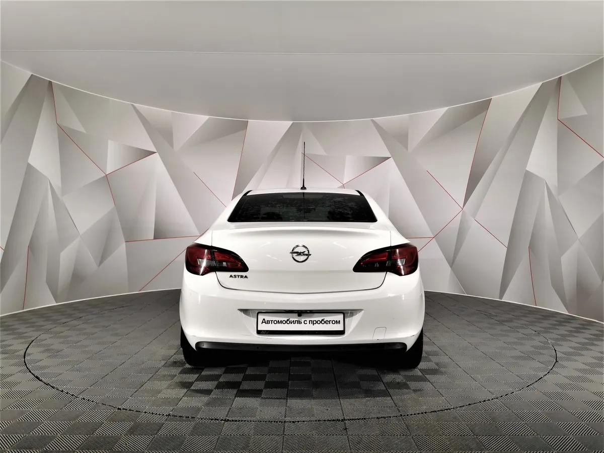 Opel Astra 1.6 AT (115 л.с.) Белый в АВИЛОН. Слайд №8