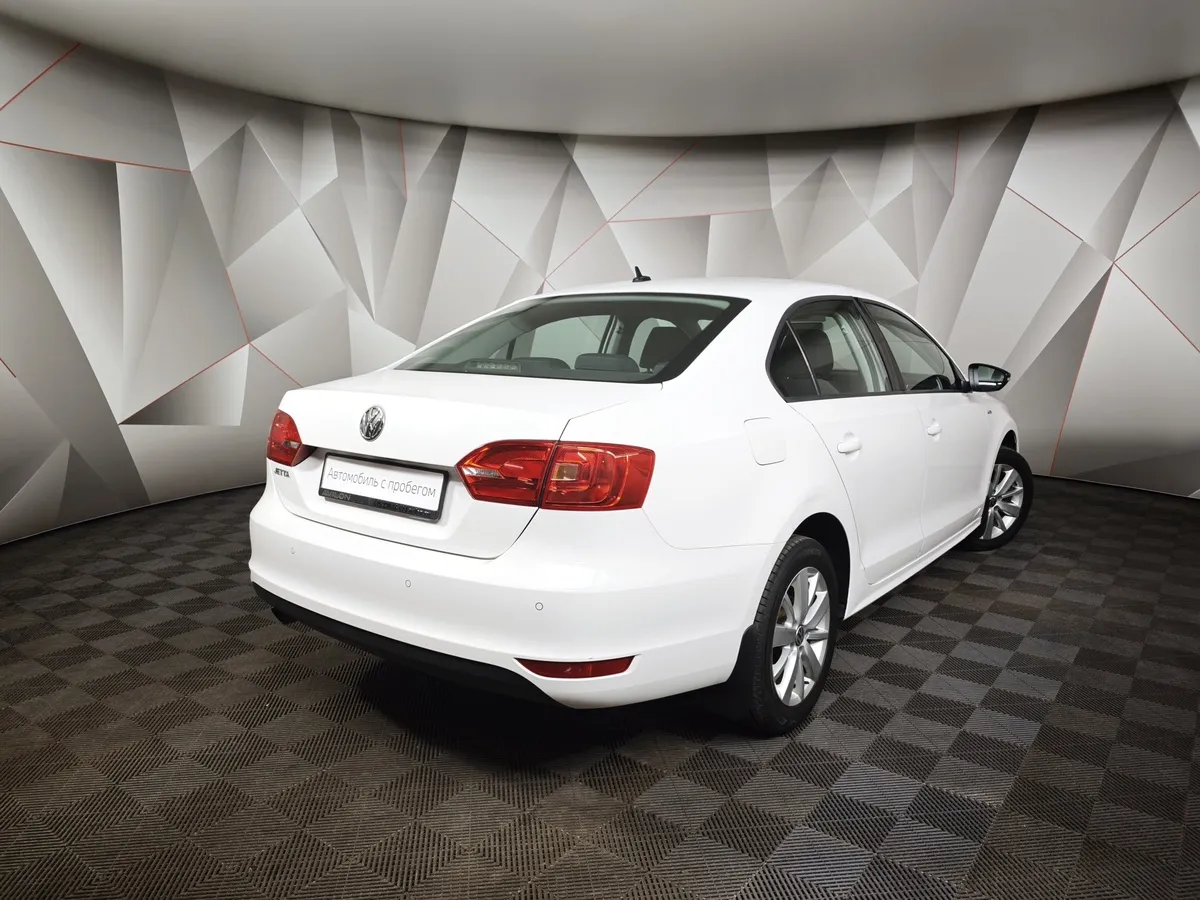 Volkswagen Jetta 1.6 MPI MT (90 л.с.) Trendline Белый в АВИЛОН. Слайд №2