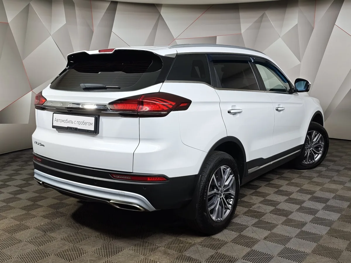 Geely Atlas Pro 1.5T AT FWD (177 л.с.) Luxury Белый в АВИЛОН. Слайд №2