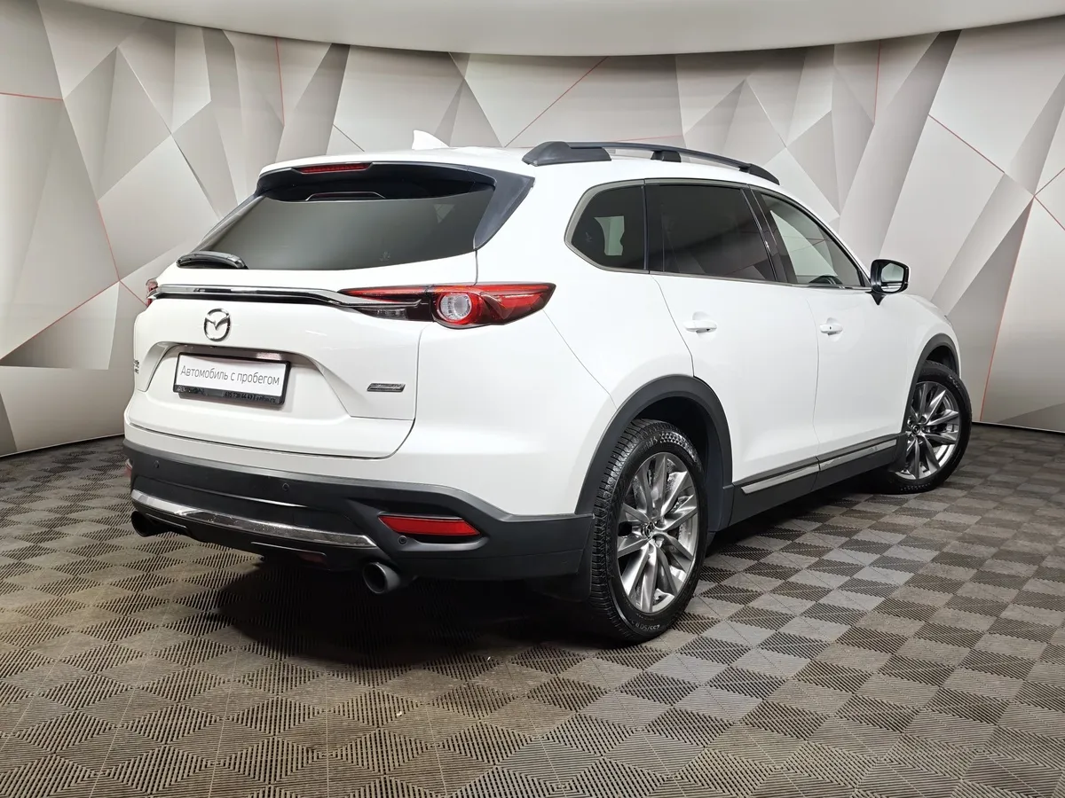 Mazda CX-9 2.5 AT AWD (231 л.с.) Белый в АВИЛОН. Слайд №2