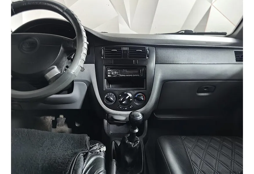 Daewoo Gentra 1.5 MT (107 л.с.) Белый в АВИЛОН. Слайд №11