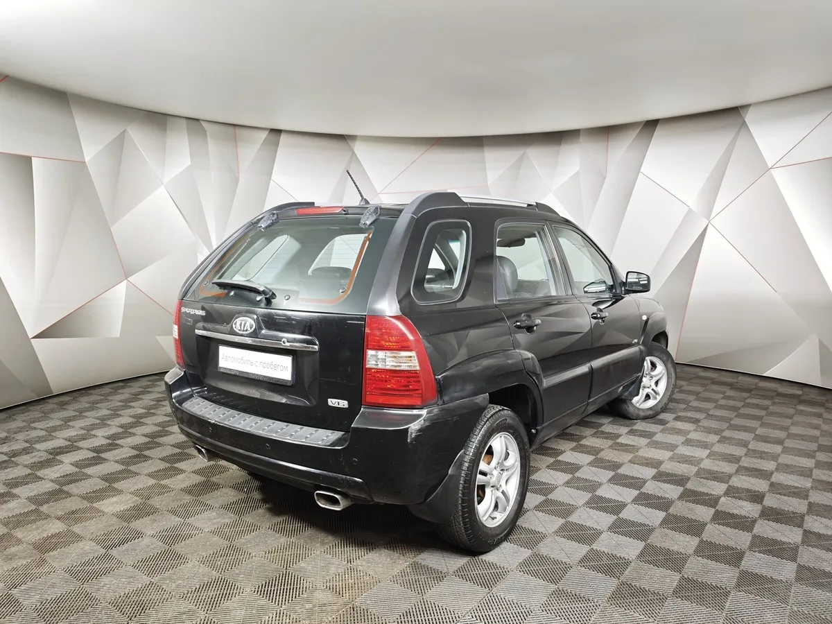 Kia Sportage 2.7 AT (175 л.с.) Черный в АВИЛОН. Слайд №2