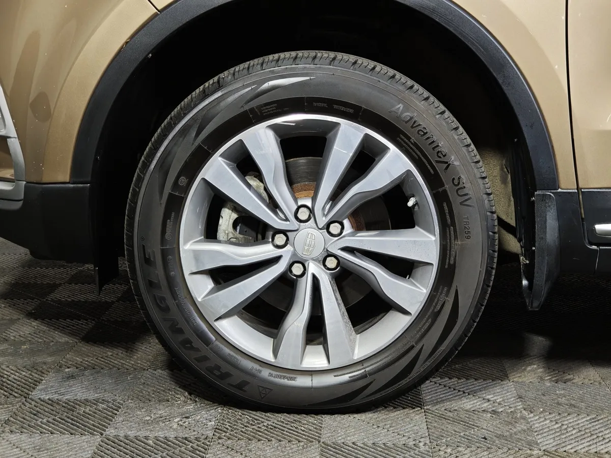 Geely Atlas 2.4 AT (148 л.с.) Comfort Желтый в АВИЛОН. Слайд №9