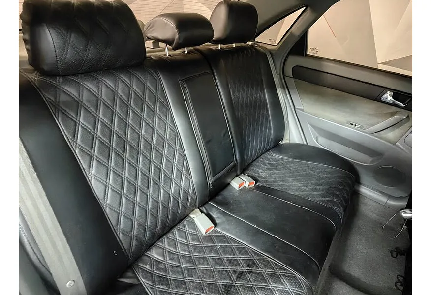 Daewoo Gentra 1.5 MT (107 л.с.) Белый в АВИЛОН. Слайд №12