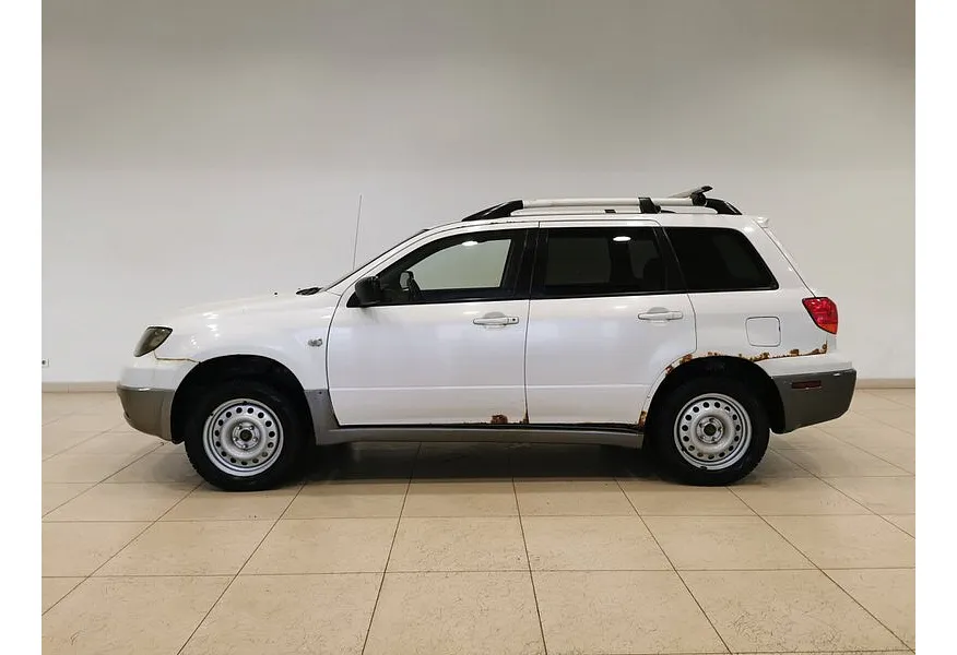 Mitsubishi Outlander 2.4 AT 4WD (160 л.с.) Белый в АВИЛОН. Слайд №5