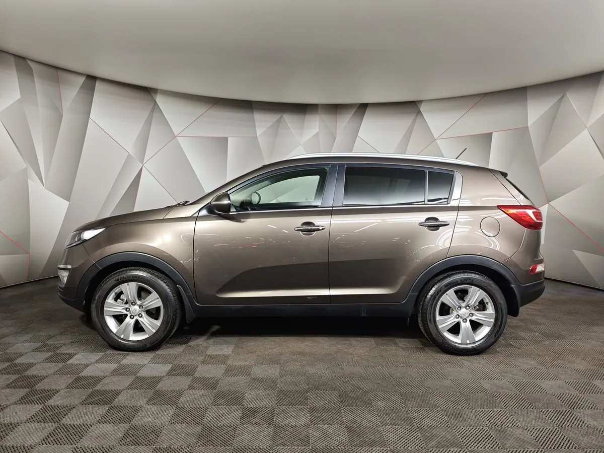 Kia Sportage 2.0 AT (150 л.с.) Коричневый в АВИЛОН. Слайд №5