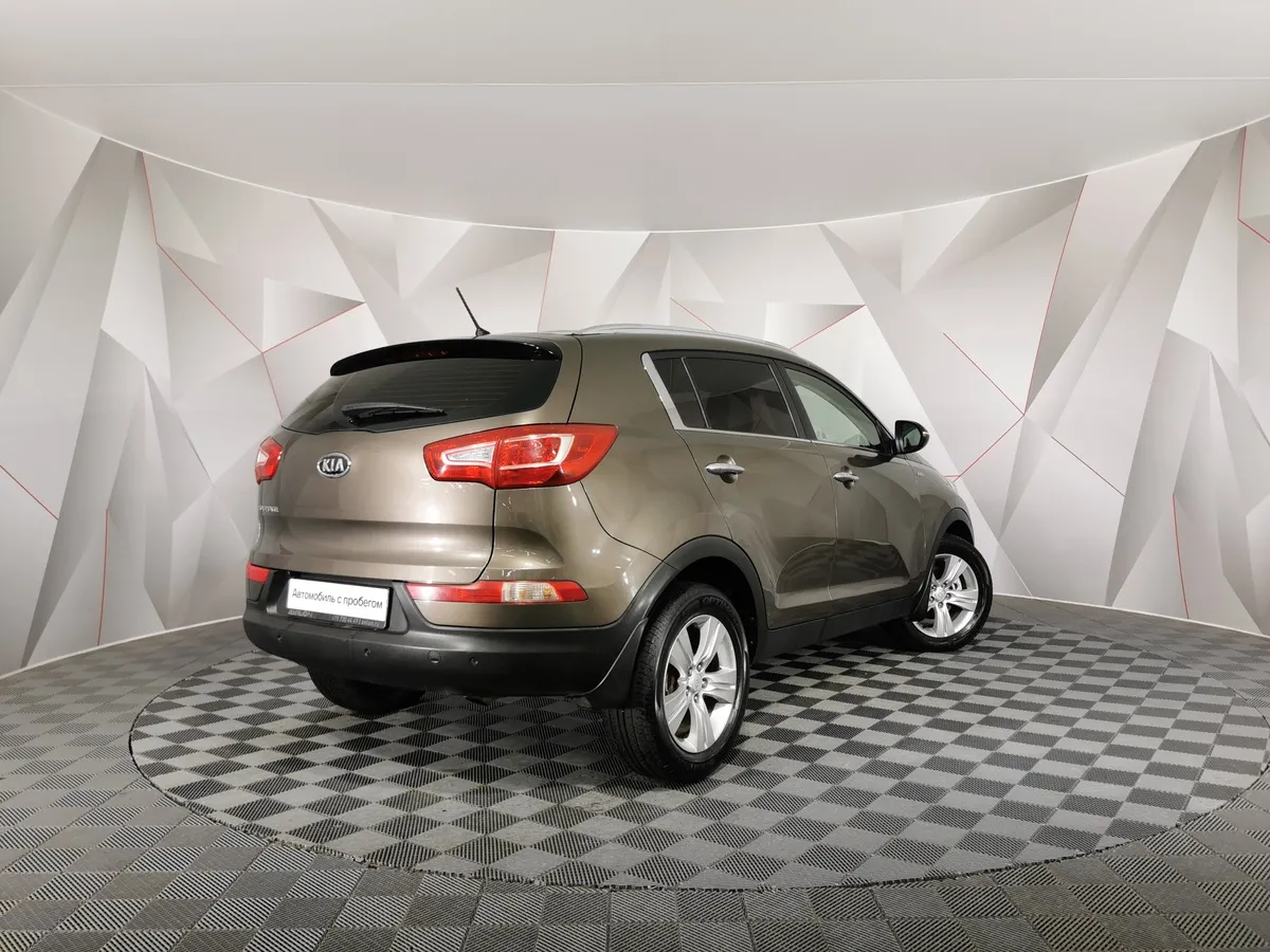 Kia Sportage 2.0 AT 4WD (150 л.с.) Luxe Коричневый в АВИЛОН. Слайд №2