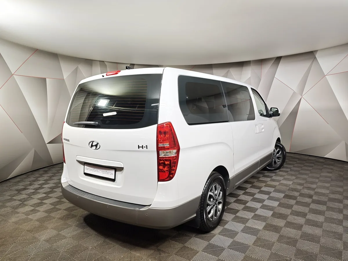 Hyundai H-1 2.5 CRDi - 5AT (170 л.с.) Business Белый в АВИЛОН. Слайд №2