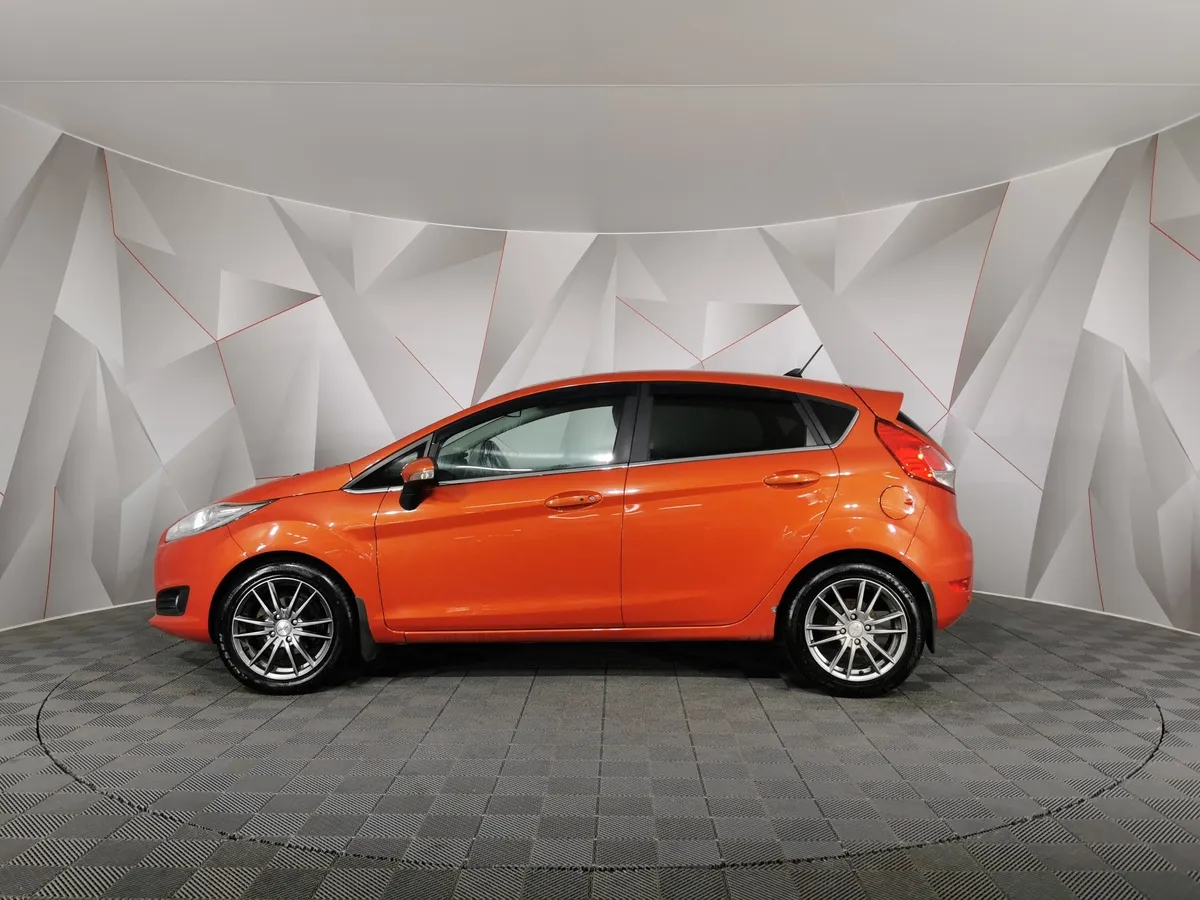 Ford Fiesta 1.4 MT (80 л.с.) Ghia Оранжевый в АВИЛОН. Слайд №5